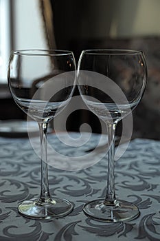 Empty glasses next to on the table
