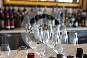 Empty glasses for wine near a bar rack, close up