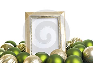 Empty Gold Frame with Christmas Ornaments on a White Background