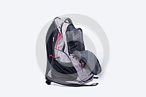 Empty gray backpack isolated on white background