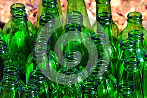 Empty green glass bottles, glass recycling concept background