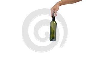 Empty, green, glass wine bottle in hand on a white background, isolate