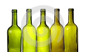 Empty green glass wine bottles isolated on white