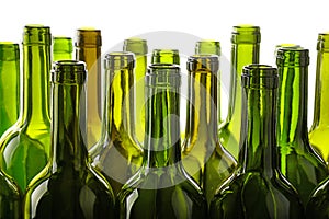 Empty green glass wine bottles isolated on white