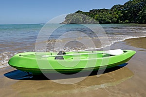 Empty green kayak