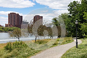 Empty Green Riverfront Trail at Randalls and Wards Islands during Spring in New York City photo