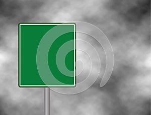 An empty green traffic sign against a dark, cloudy and thunderous sky. sign for your text space and message. Ve