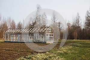 Empty greenhouse in spring in the garden