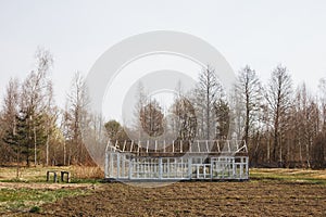 Empty greenhouse in spring in the garden