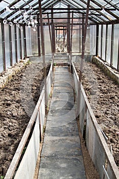 empty greenhouse with treated ready-to-plant ground