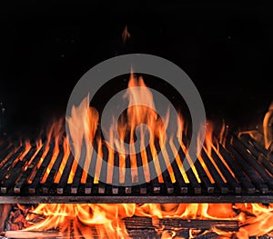 Empty grill grate and tongues of fire flame. Barbeque night background