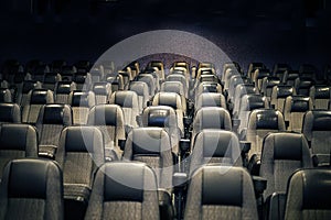 empty hall with chairs in a cinema before watching a movie,