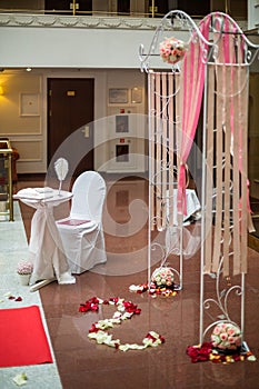 Empty hall for a wedding ceremony with a table for