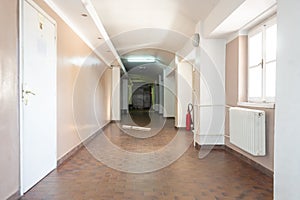 Empty hallway inside an old school building