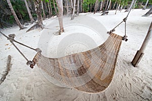 Empty hammock at the beach