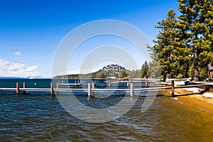 Empty harbor piers on a sunny winter day in south Lake Tahoe, Sierra Mountains, California