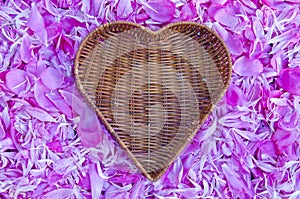 Empty heart form wicker baske ton peony petals