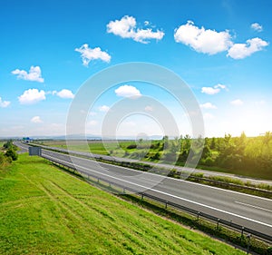 Empty highway with blue sky