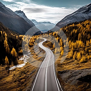 An empty highway is captured from a top-down perspective, offering an aerial view of the great landscape it traverses