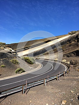 Empty highway curve , desert landscape