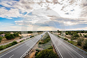 Empty highway in Mallorca with spectacular sky photo