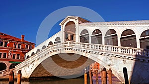 Empty historical Rialto bridge with arch passage in Venice