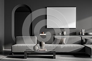 Empty horizontal canvas in dark grey living room with oval mirror photo