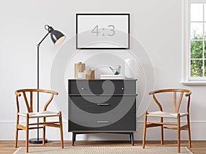 Empty horizontal frame 4:3 on white wall in scandinavian interior with wood floor, black dresser, biege rug, two armchairs. photo