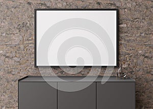 Empty horizontal picture frame on brown stone wall in modern living room. Mock up interior in contemporary style. Free