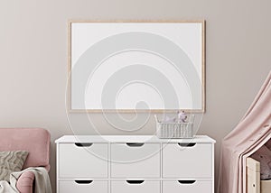 Empty horizontal picture frame on cream wall in modern child room. Mock up interior in scandinavian style. Free, copy