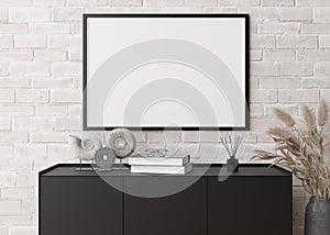 Empty horizontal picture frame on white brick wall in modern living room. Mock up interior in contemporary style. Free