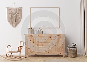 Empty horizontal picture frame on white wall in modern child room. Mock up interior in scandinavian, boho style. Free