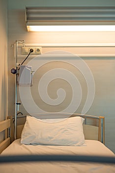 Empty Hospital Bed With Medical Device