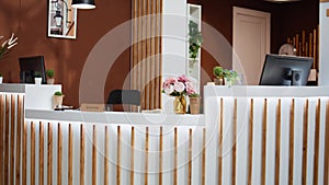 Empty hotel reception entryway with glamorous decorations