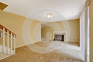 Empty house interior. Living room with fireplace