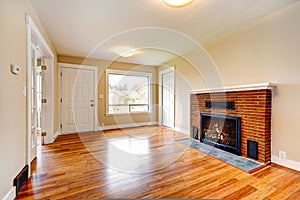 Empty house interior. Living room in soft ivory with fireplace