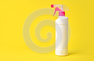 Empty household chemicals spray bottle, copy space