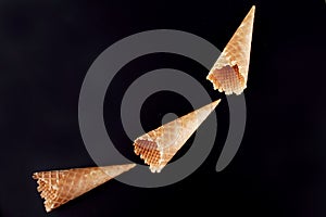 Empty ice cream cones arranged as skyrockets