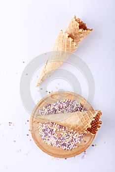 Empty ice cream cones with colorfule sprikles