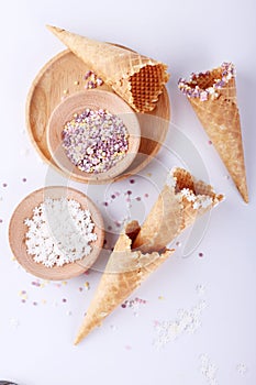 Empty ice cream cones with colorfule sprikles