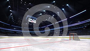 Empty ice hockey arena inside playground view illuminated by spotlights