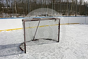 Empty ice hockey goal outdoors