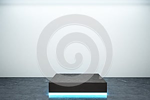 Empty illuminated pedestal