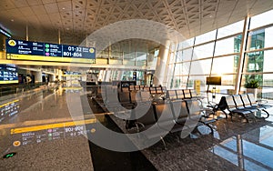 Empty interior view of the Wuhan Tianhe international airport Terminal 3 with alley and seating area in China