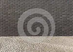 Empty interior with a wall from a dark brick with a pattern and