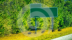 Empty interstate road sign on the left side of the road