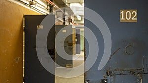 Empty Jail Cells. Prison Interior. Metal Door Protect Prisoner From Inside to Escape. Prison Cells Bars on Window. Jail, Detail of