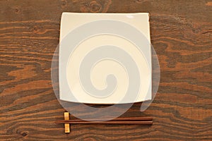 Empty Japanese dish with chopsticks