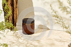 Empty jar for cosmetics. Mockup for natural cosmetics. Aesthetic composition with aromatic candle in jar. Mockup soy wax candle in