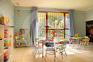 Empty kindergarten classroom photo